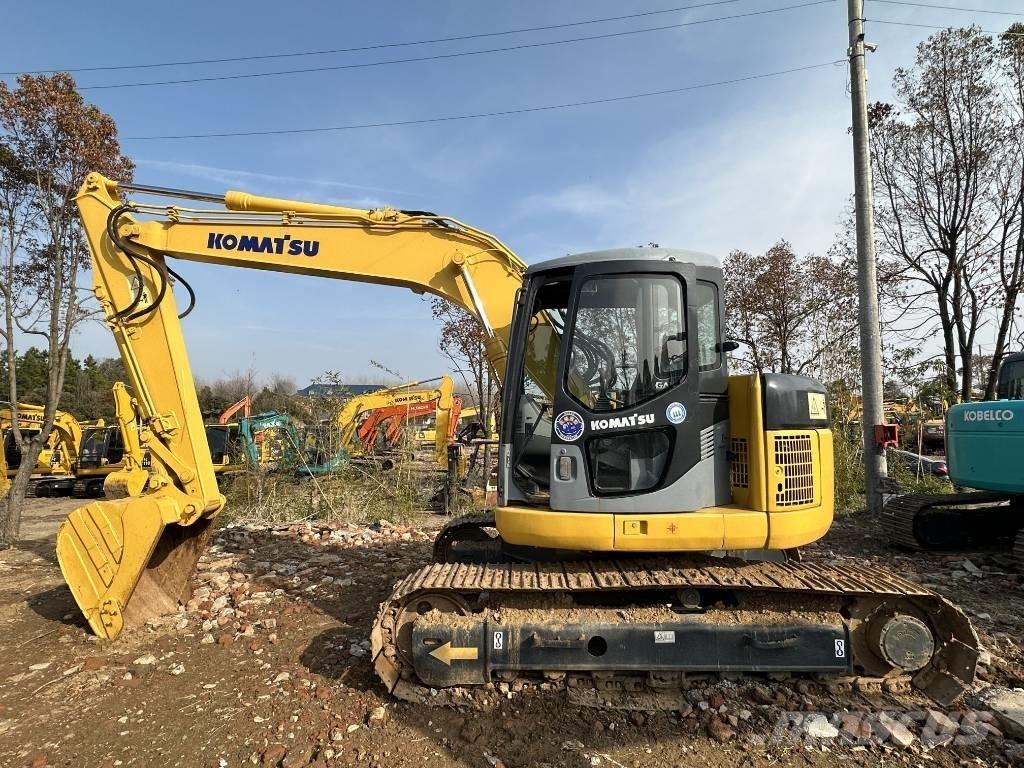 Komatsu PC 128 US Beltegraver