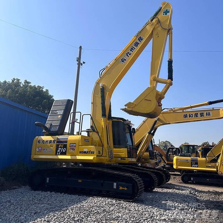 Komatsu PC210LC-8 Beltegraver