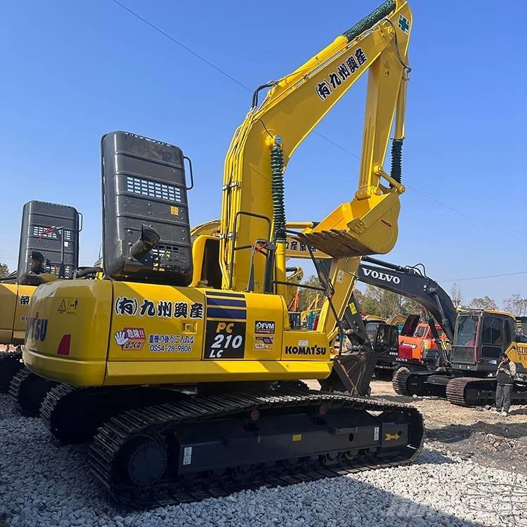 Komatsu PC210LC-8 Beltegraver