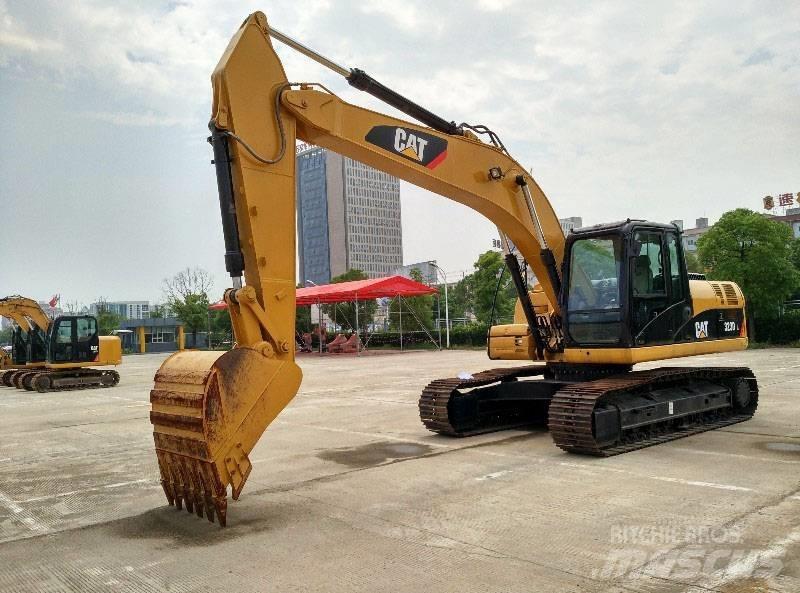 CAT 323 Beltegraver