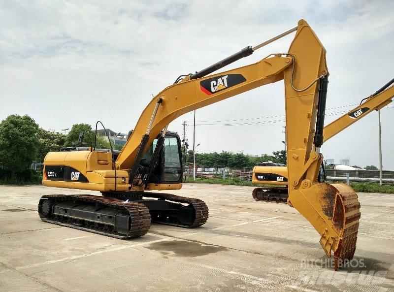 CAT 323 Beltegraver