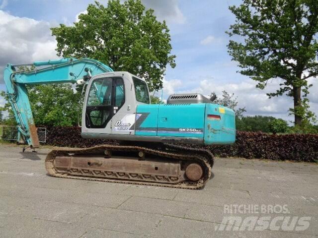 Kobelco SK250NLC Beltegraver