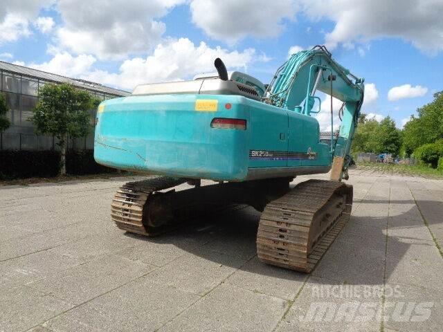Kobelco SK250NLC Beltegraver