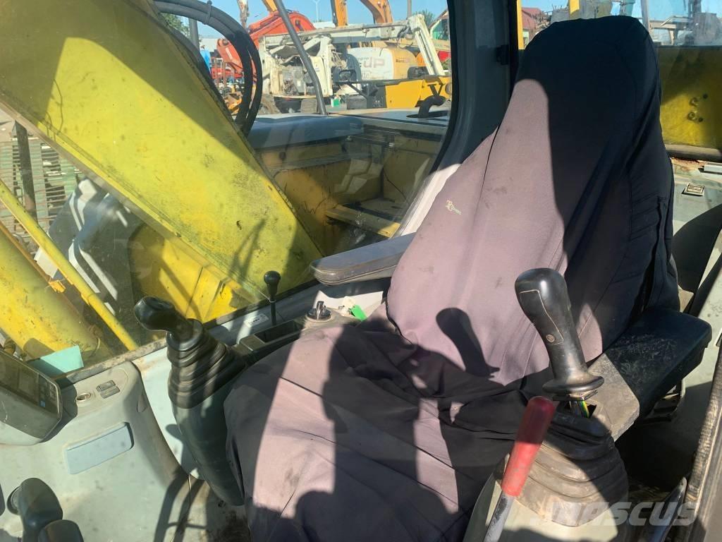 New Holland E 135 SR Beltegraver