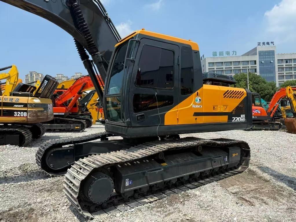 Hyundai 220HD Beltegraver