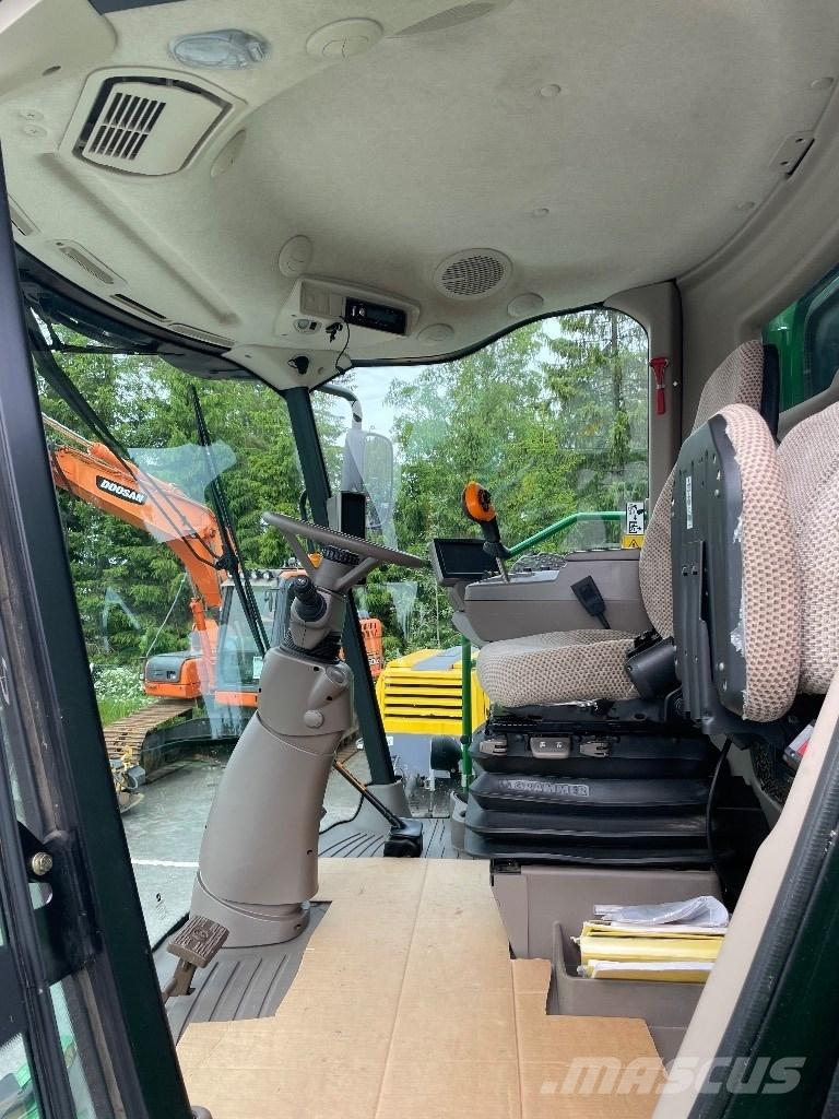 John Deere W540 Skurtreskere