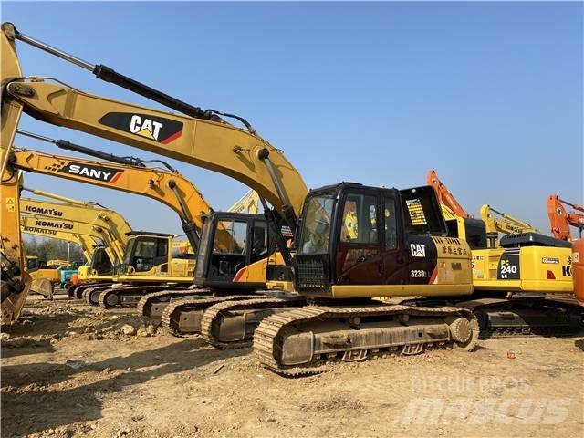 CAT 323D Beltegraver