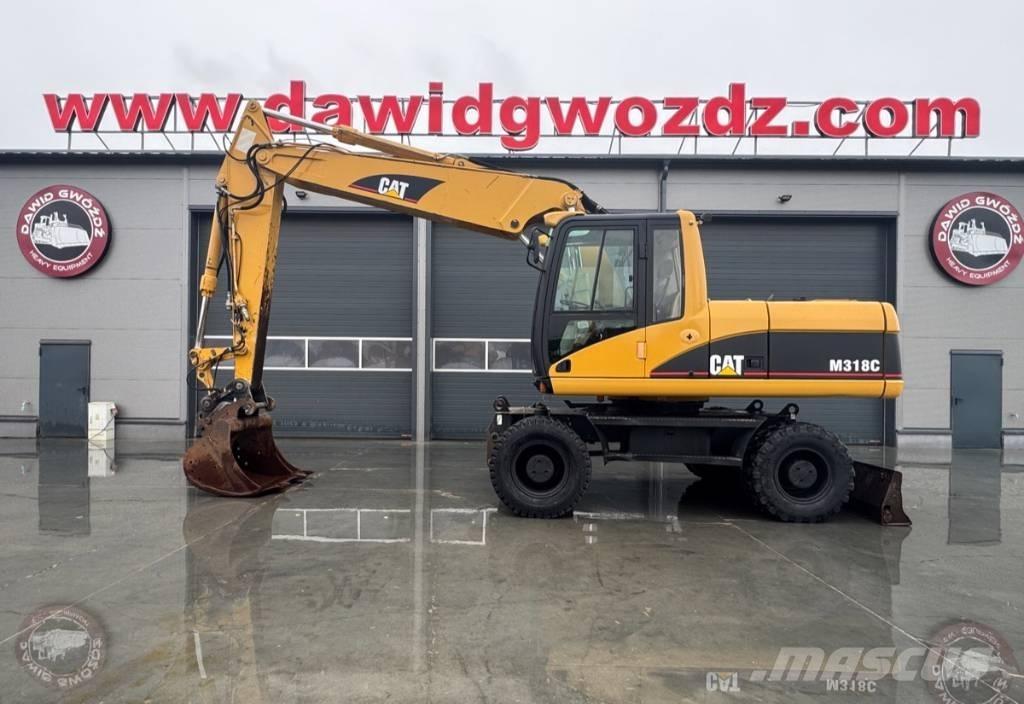 CAT M 318 C Hjulgravere