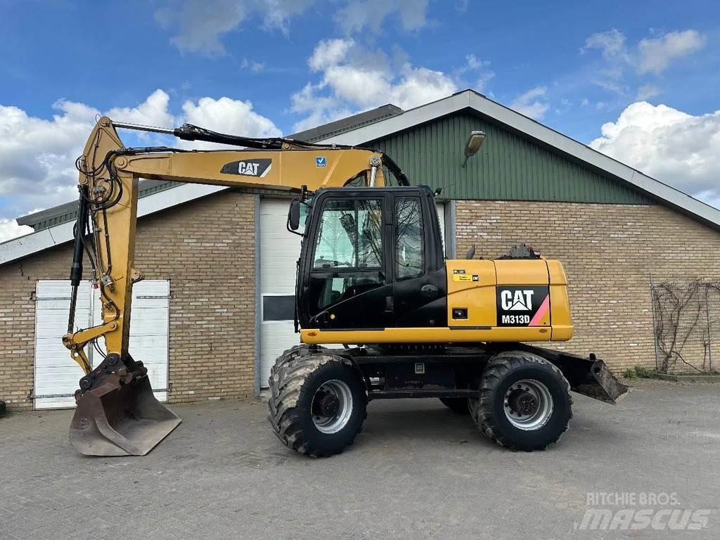 CAT M313D Hjulgravere