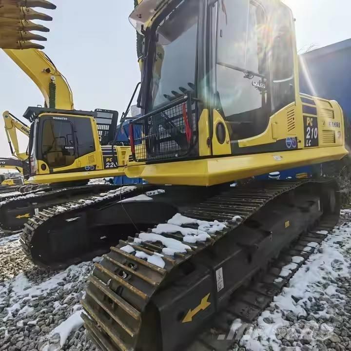 Komatsu PC 210 LC Beltegraver