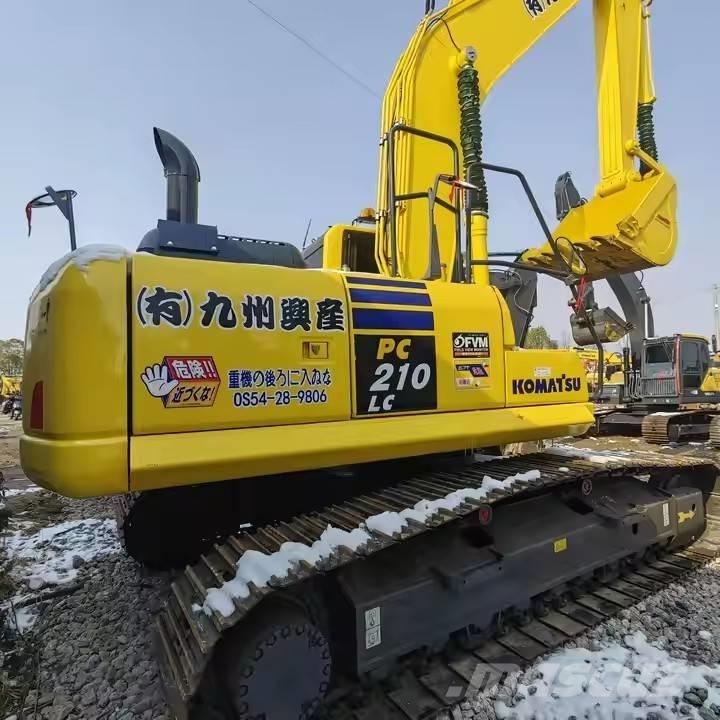 Komatsu PC 210 LC Beltegraver
