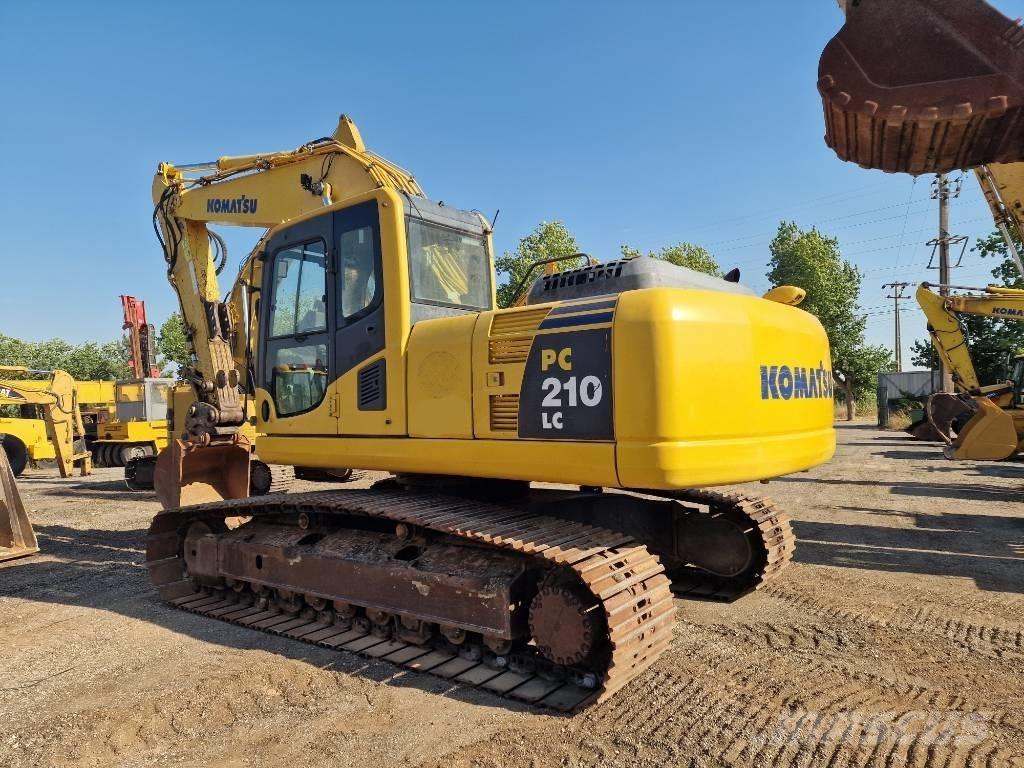 Komatsu PC 210 LC-8 Beltegraver