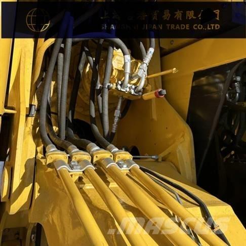 Komatsu PC 210 Beltegraver