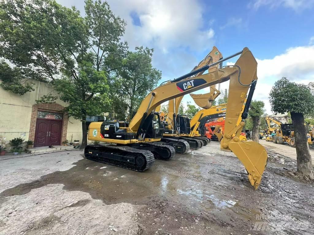 CAT 323 D Beltegraver