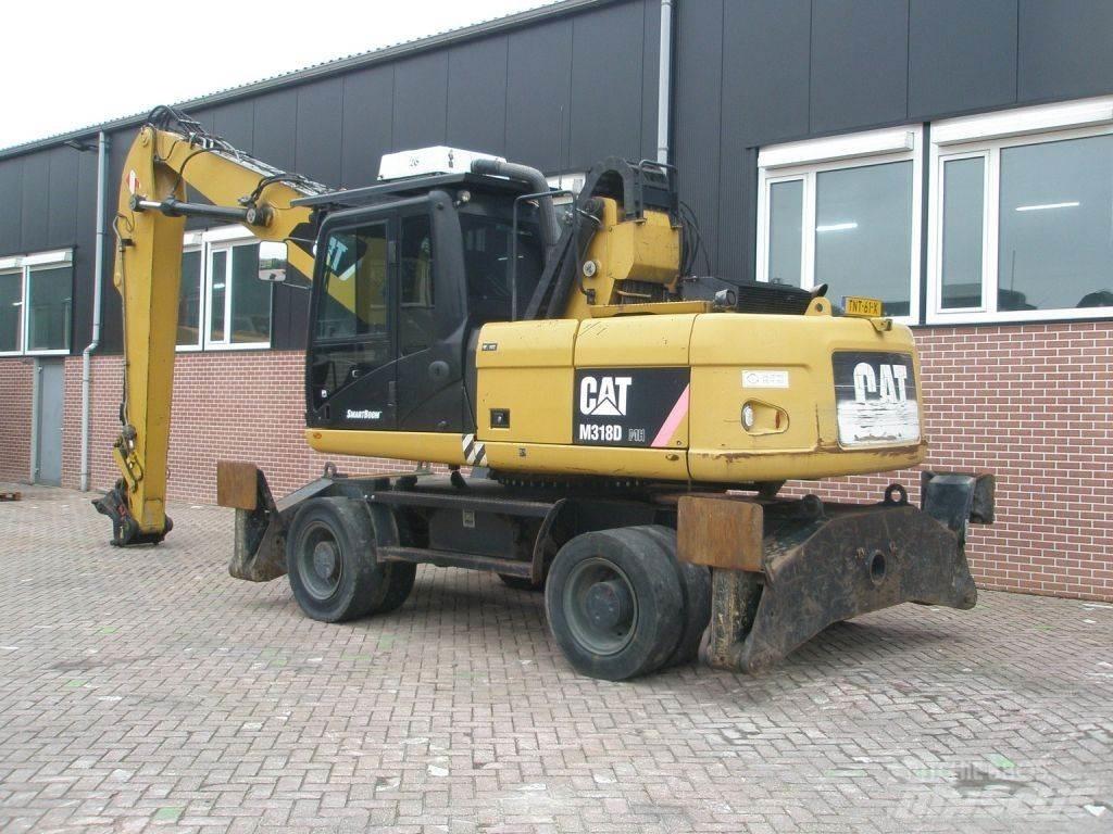CAT M318D Hjulgravere