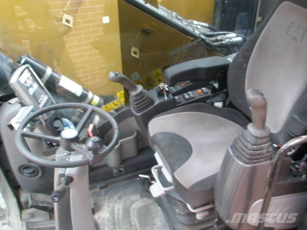 CAT M318D Hjulgravere