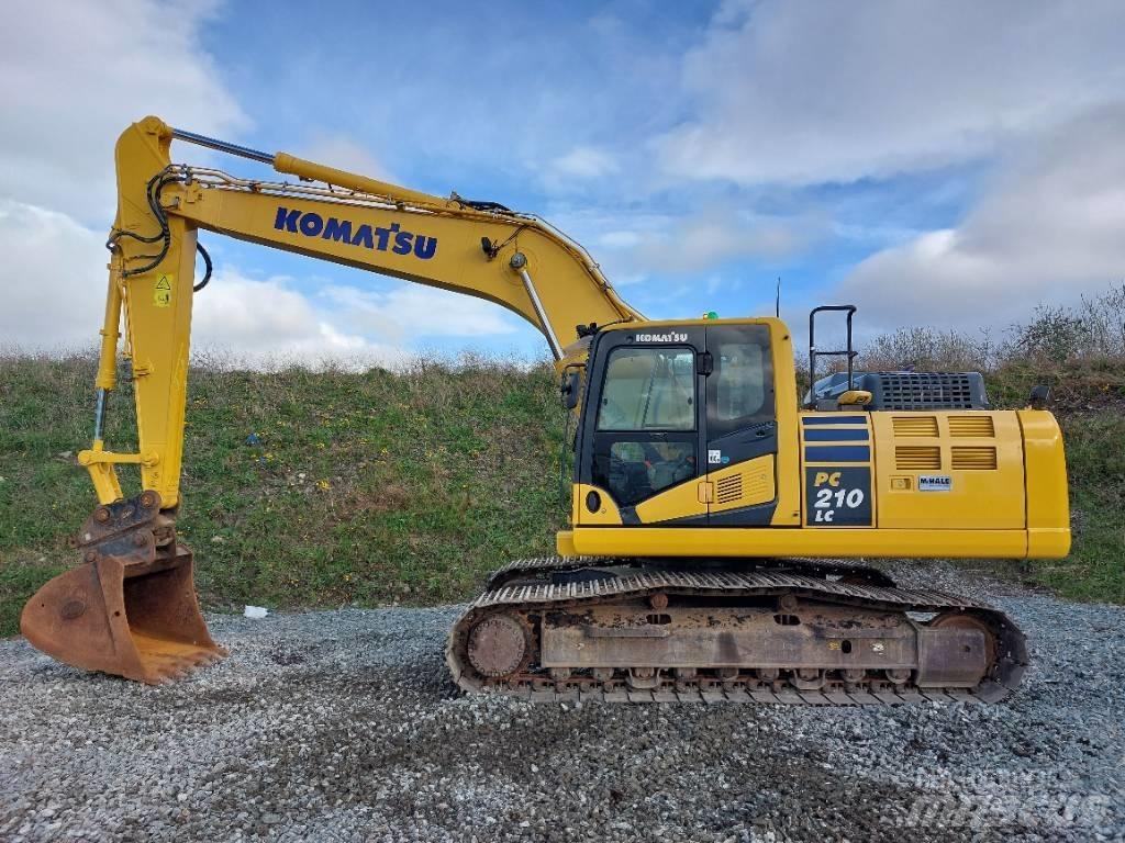 Komatsu PC210LC-11 Beltegraver