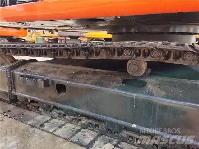 Hitachi EX 120 Beltegraver