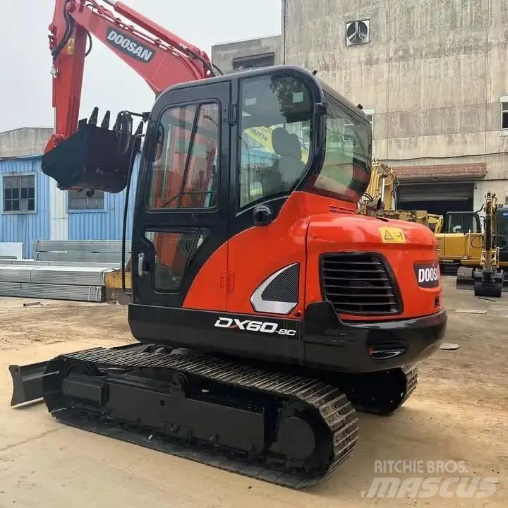Doosan DX60 Beltegraver