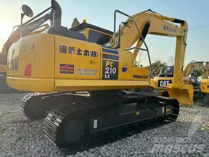 Komatsu PC 210 LC Beltegraver