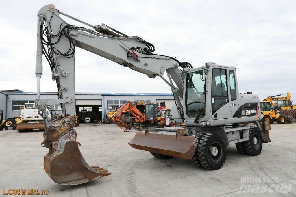CAT M 313 D Hjulgravere