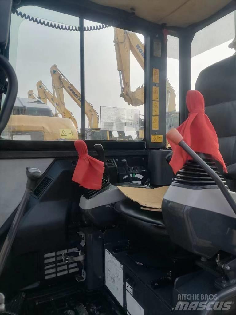 Komatsu PC56-7 Beltegraver