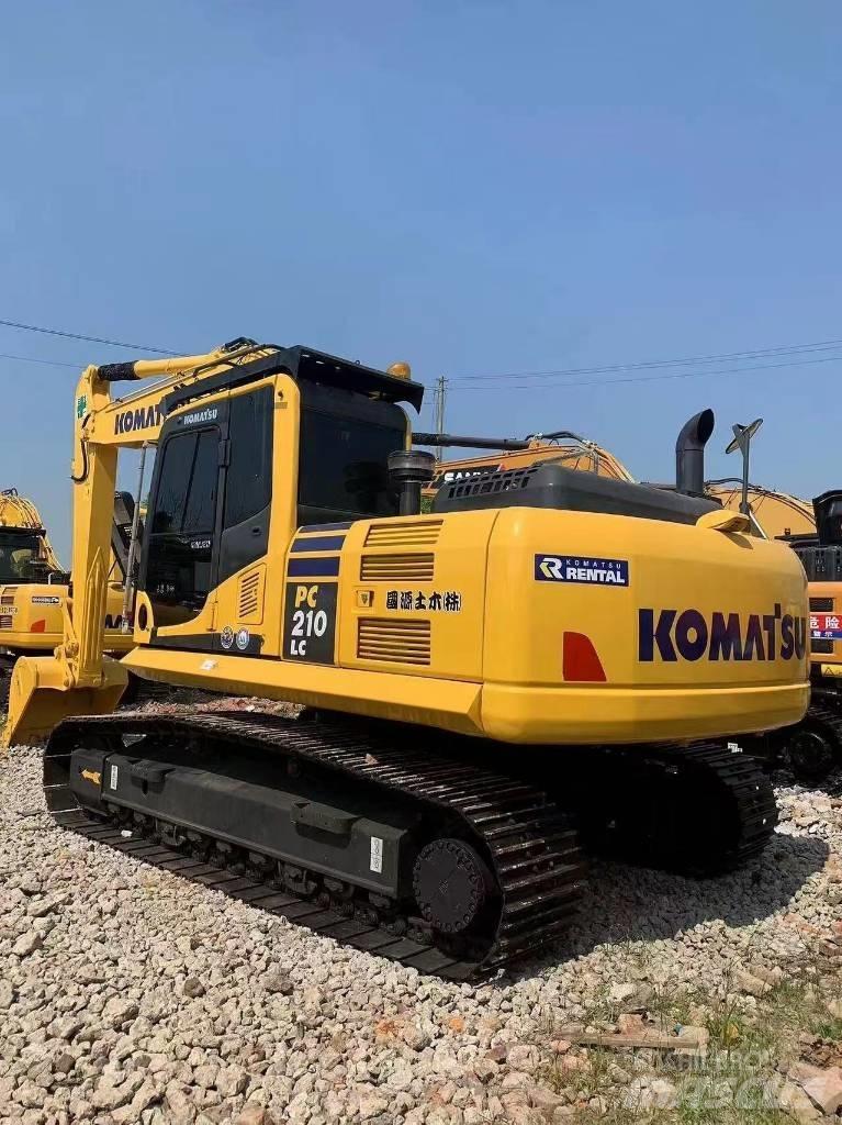 Komatsu PC 210 LC Beltegraver