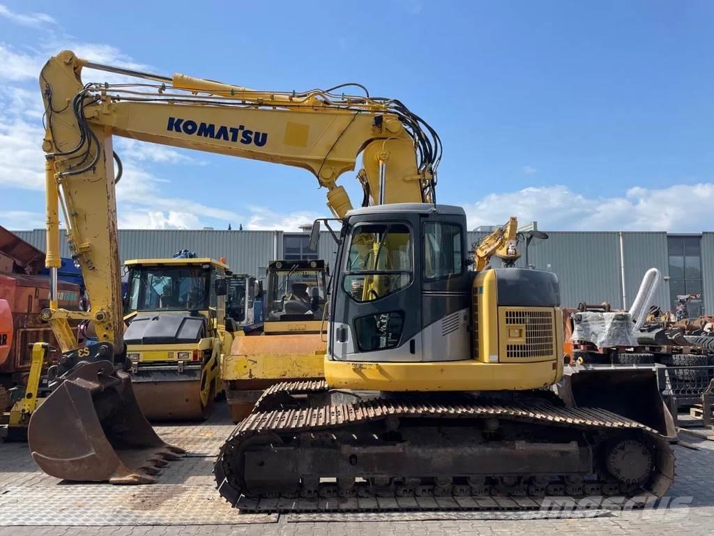 Komatsu PC228US-3 Beltegraver