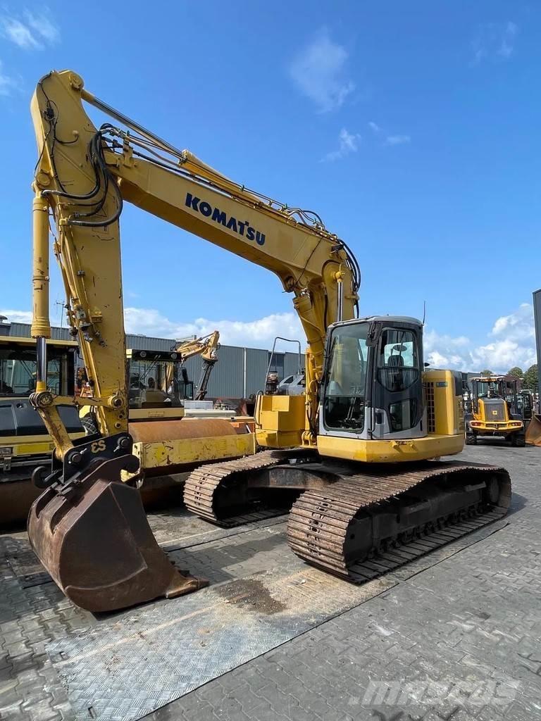 Komatsu PC228US-3 Beltegraver