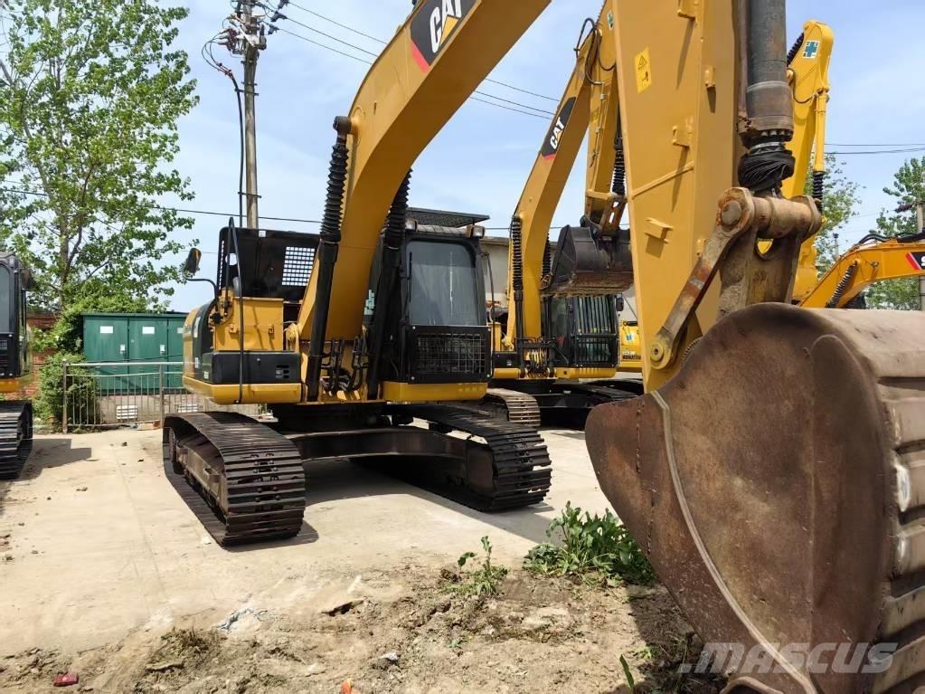 CAT 323 D Beltegraver