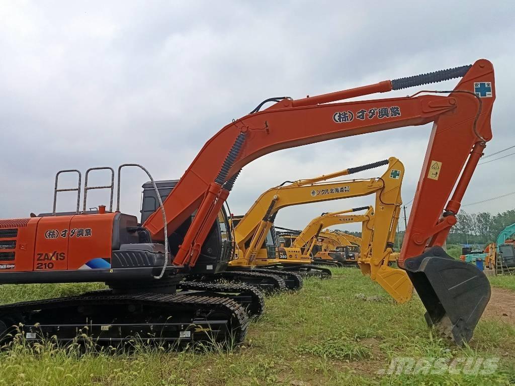 Hitachi ZX 210 Beltegraver