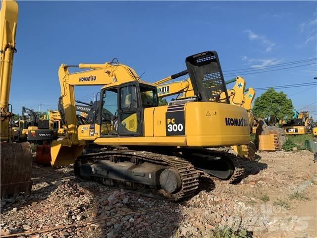 Komatsu PC300-7 Beltegraver