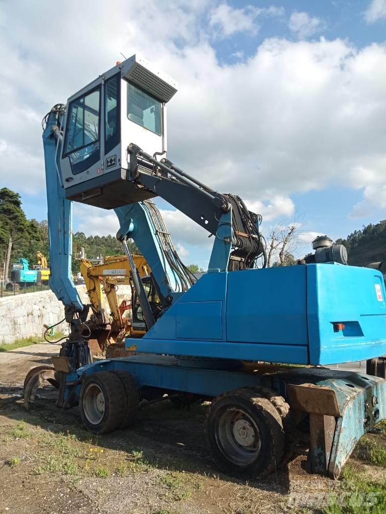 Fuchs MHL 331 Gravemaskiner for avfallshåndtering
