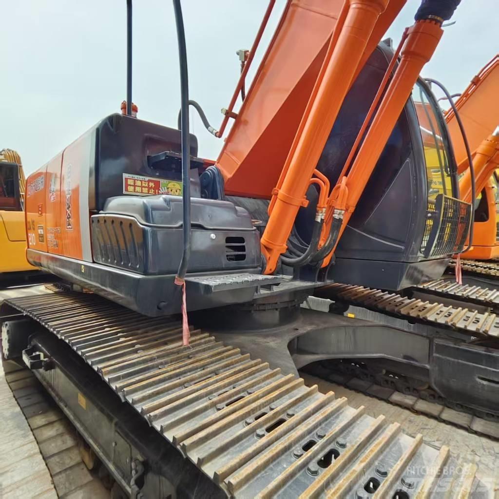 Hitachi ZX 210 Beltegraver
