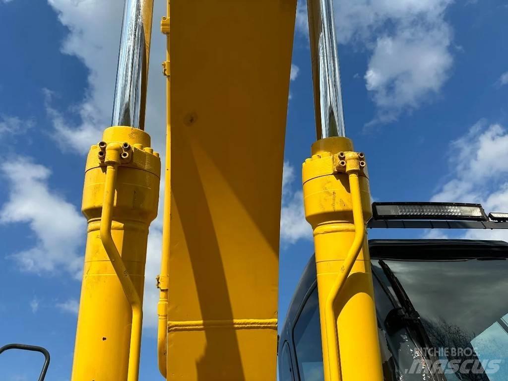 New Holland E215 Beltegraver