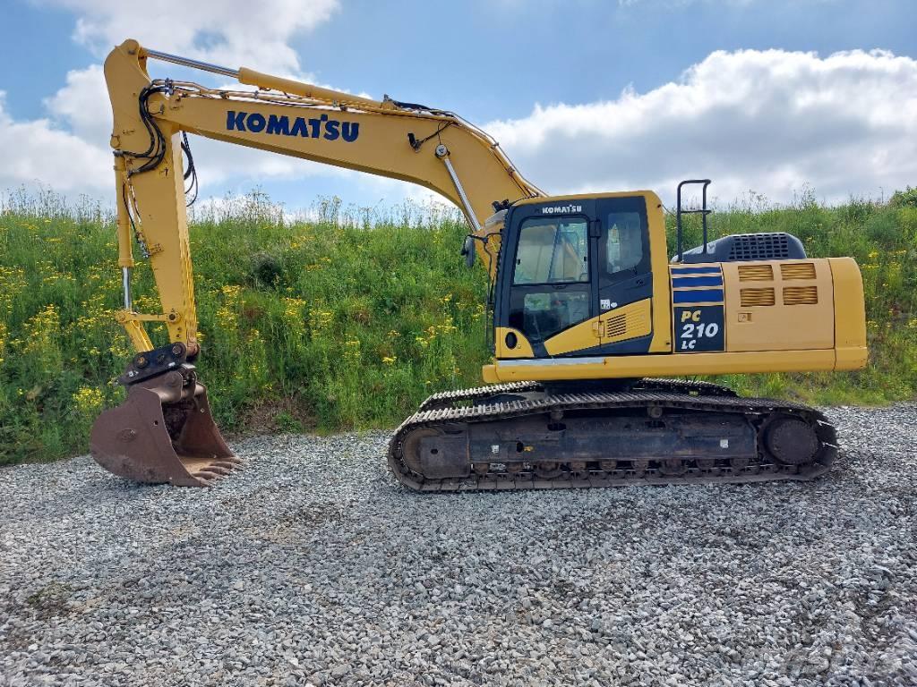 Komatsu PC210LC-10 Beltegraver