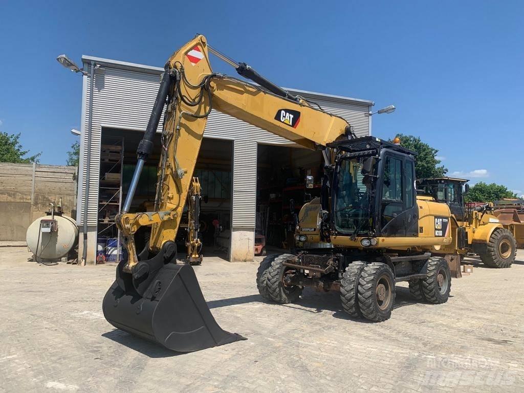 CAT M 318 D Hjulgravere