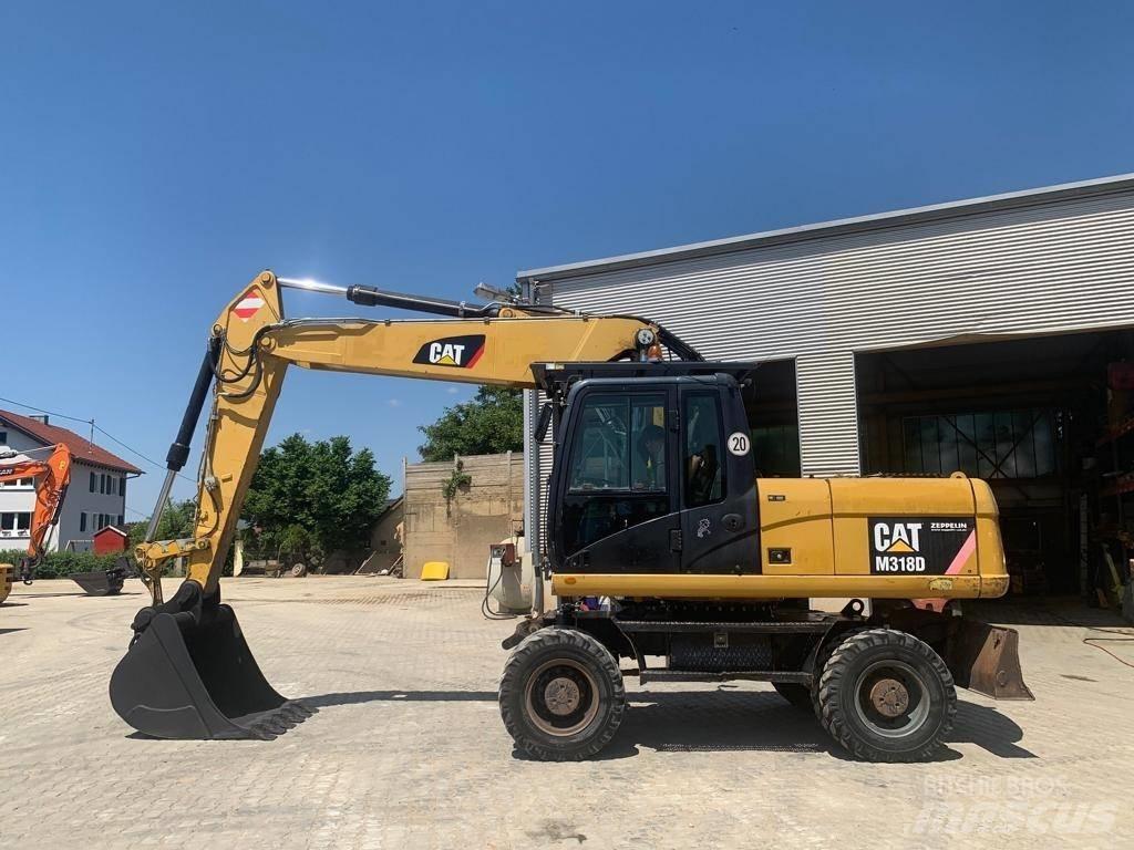CAT M 318 D Hjulgravere