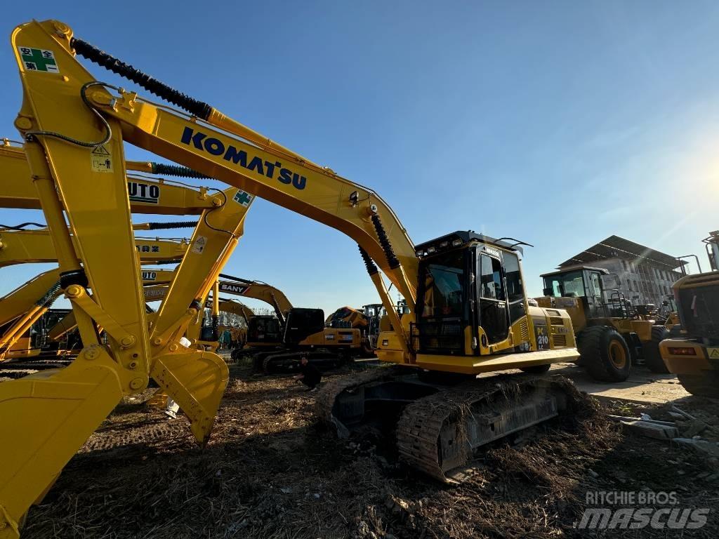 Komatsu PC 210 Beltegraver