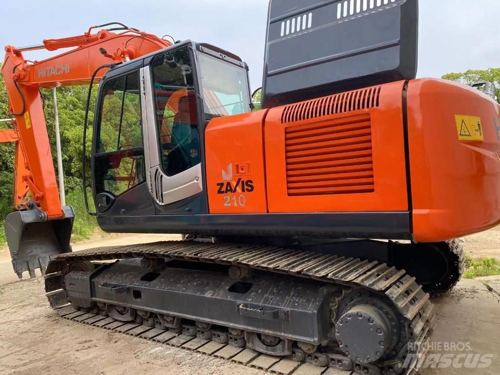 Hitachi ZX 210 Beltegraver