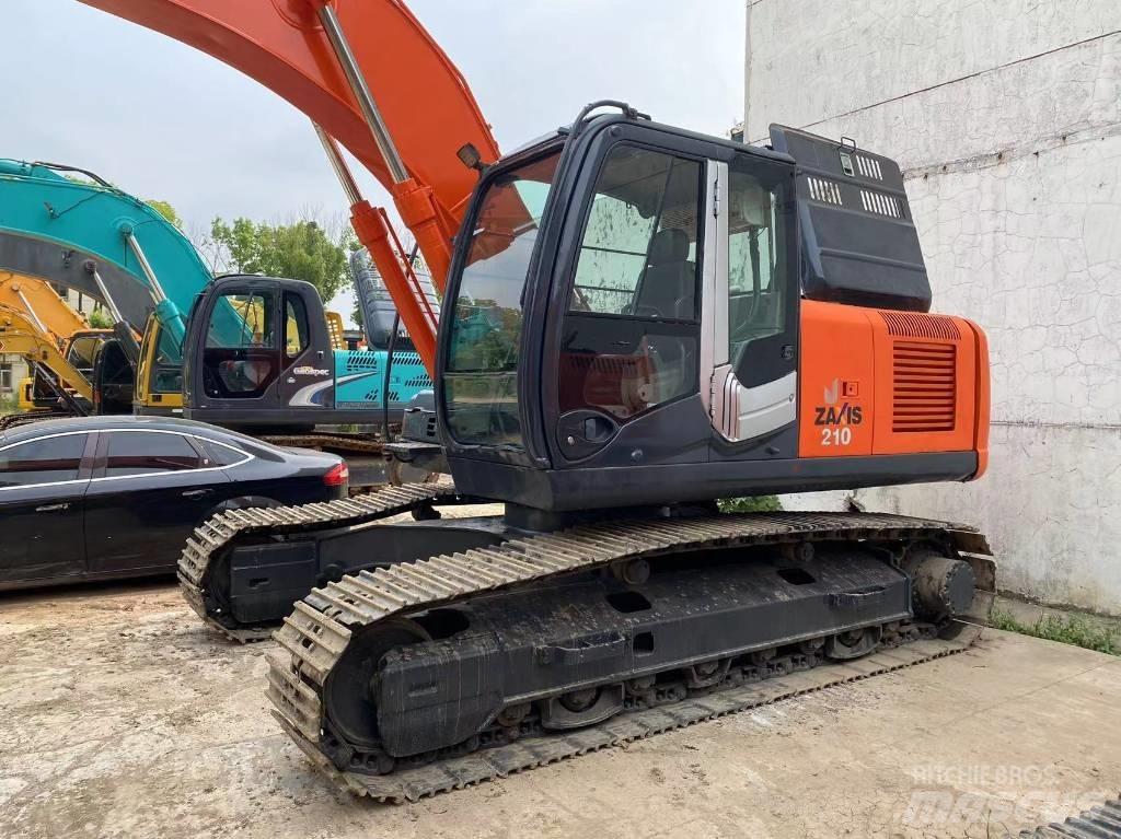 Hitachi ZX 210 Beltegraver