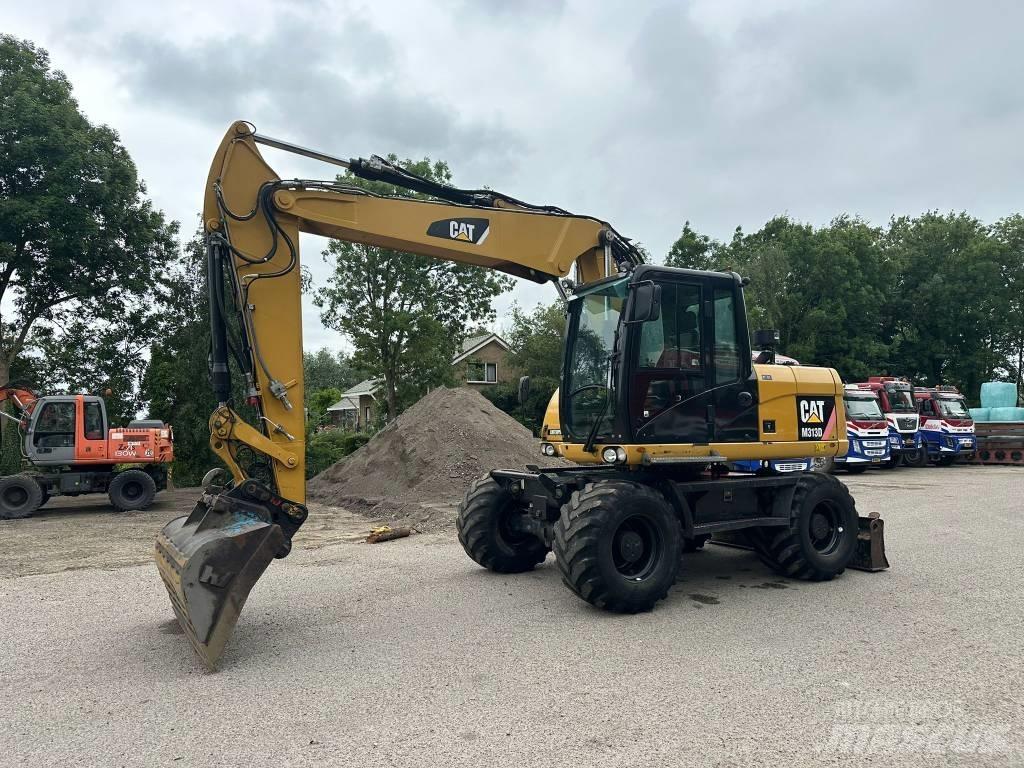 CAT M 313 D Hjulgravere