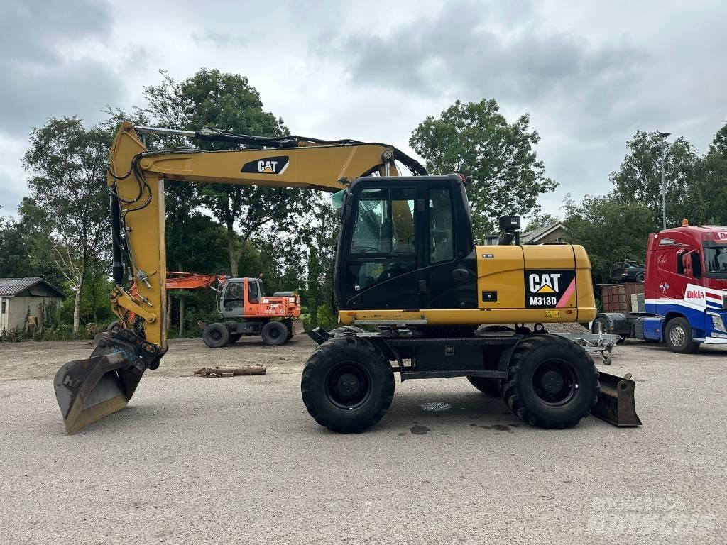 CAT M 313 D Hjulgravere