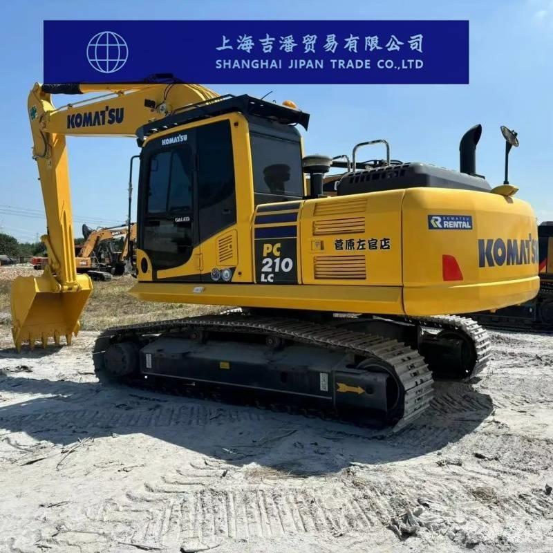 Komatsu PC 210 Beltegraver