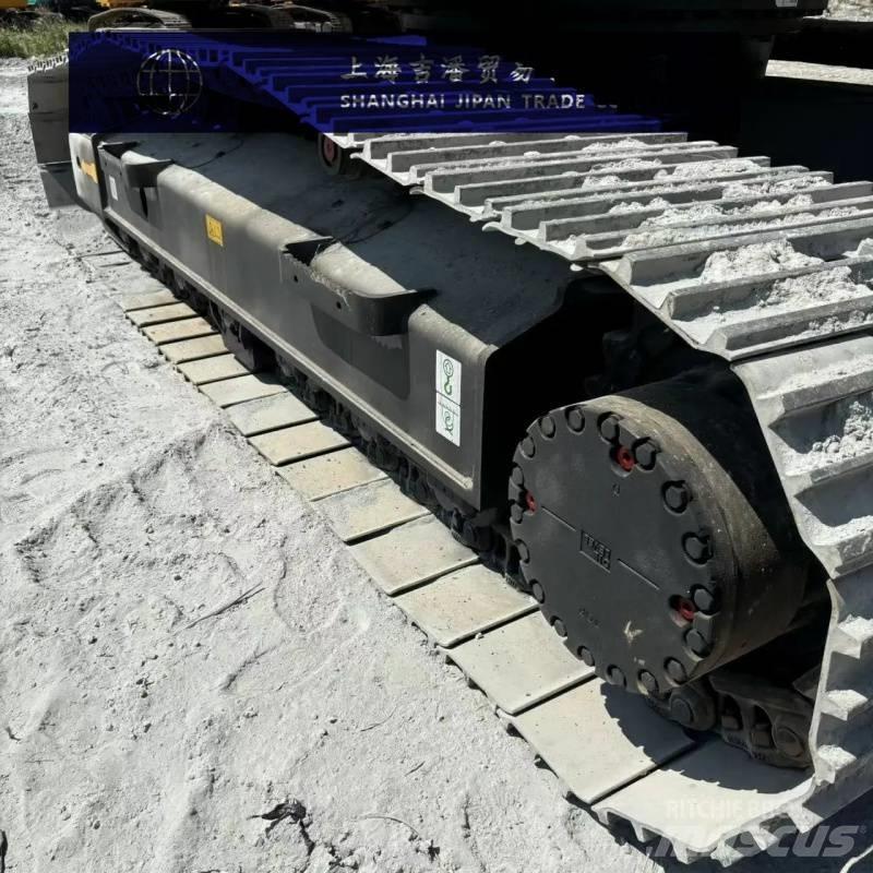 Komatsu PC 210 Beltegraver