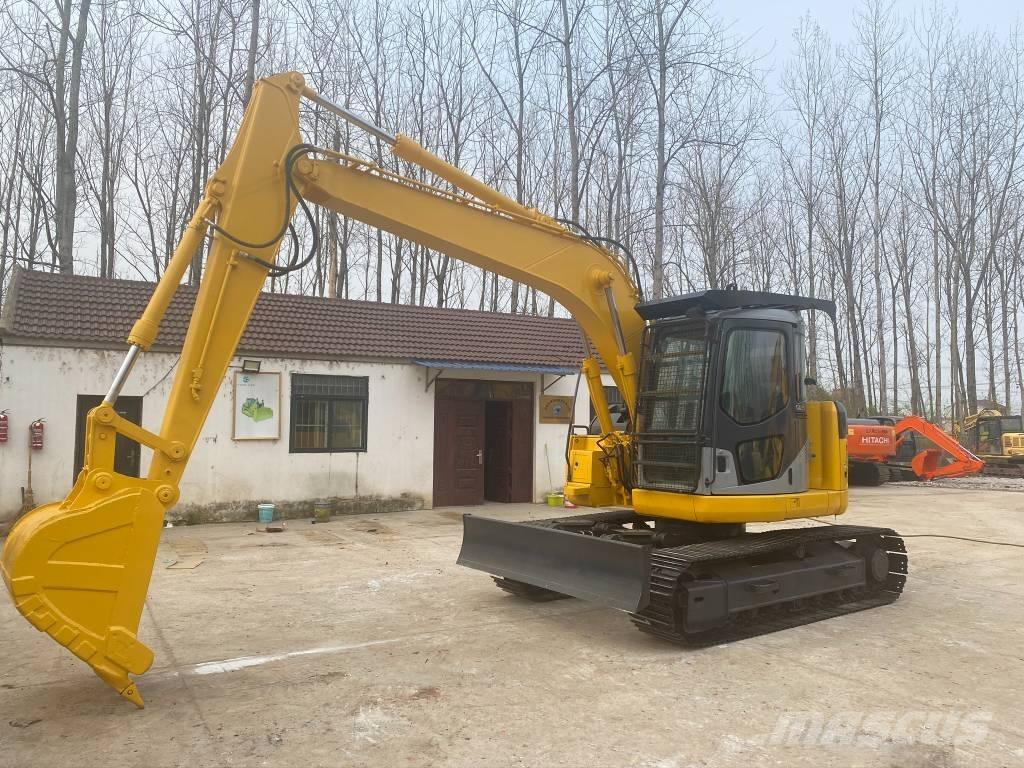 Komatsu PC128US Beltegraver