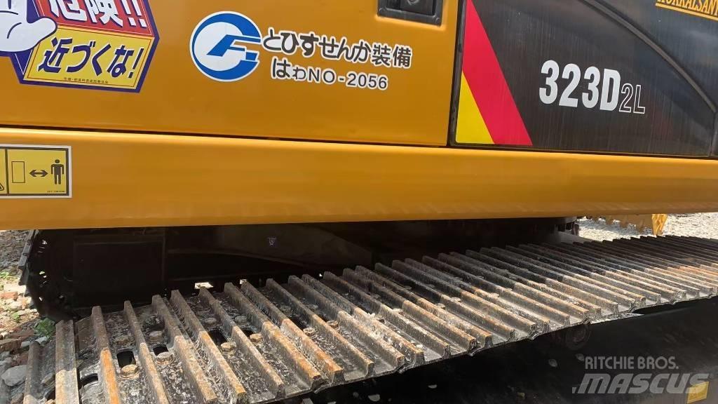 CAT 323 Beltegraver