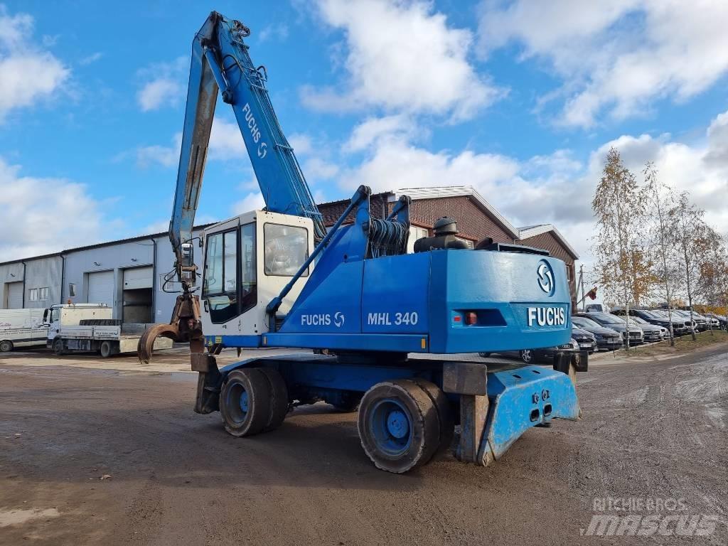 Fuchs MHL 340 Gravemaskiner for avfallshåndtering