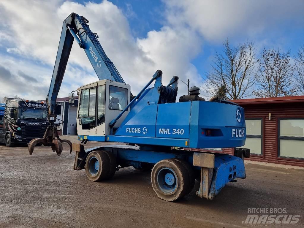 Fuchs MHL 340 Gravemaskiner for avfallshåndtering