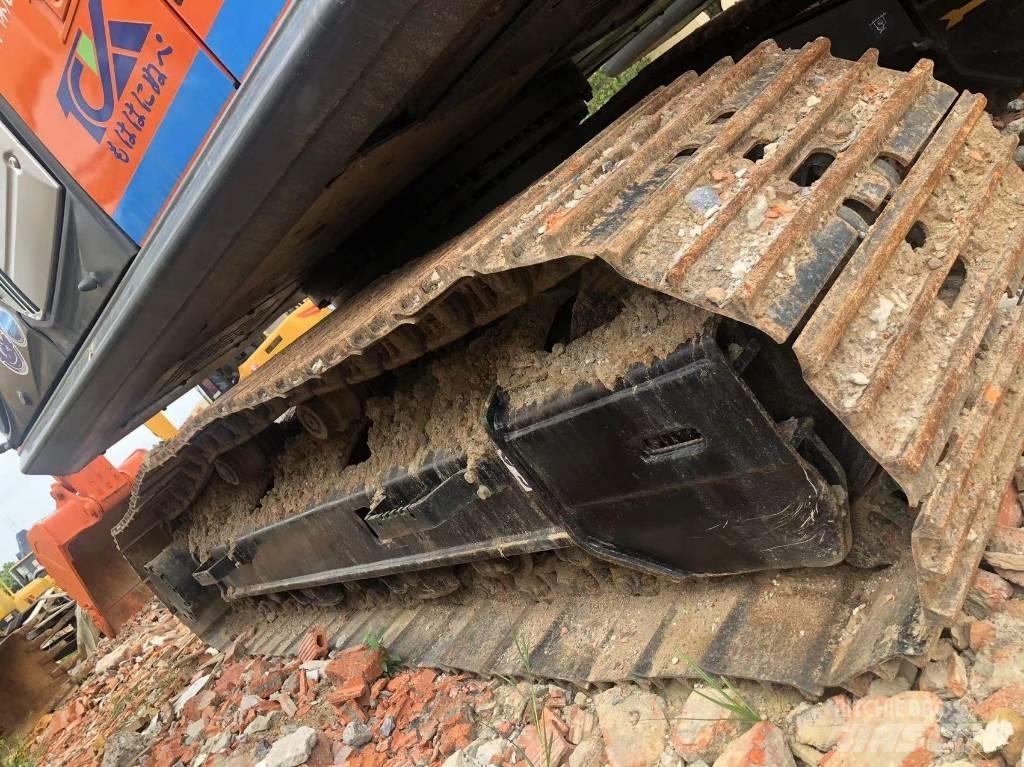Hitachi ZX 210 Beltegraver